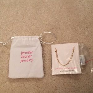 Jennifer zeuner double star gold necklace.